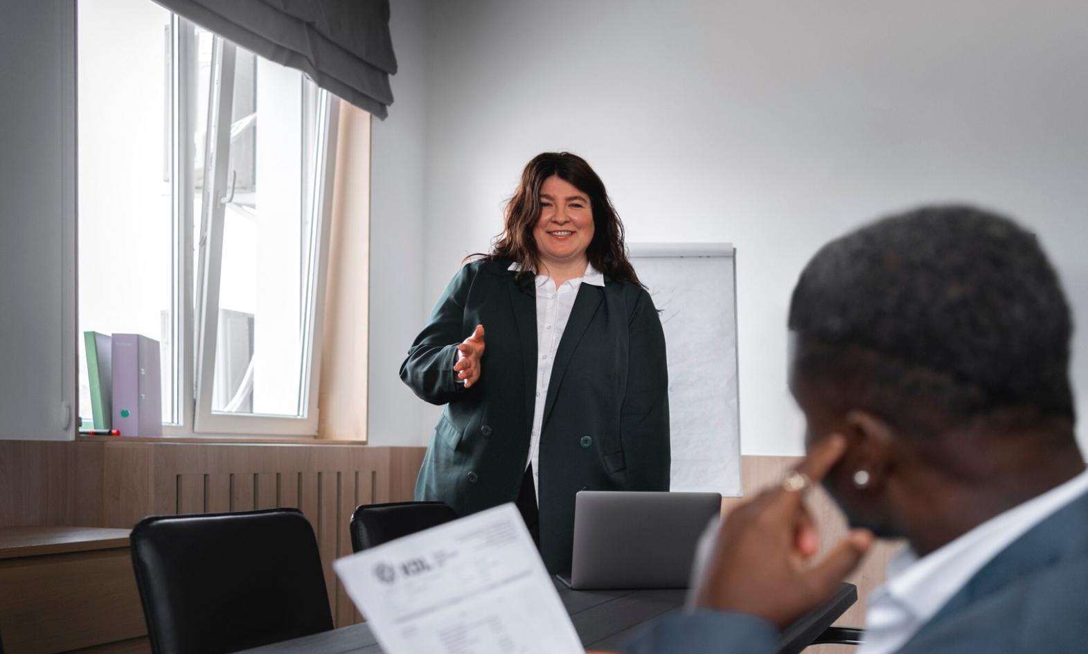 Workshop participants reviewing financial documents and budget analysis materials during group session